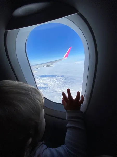 Little Baby Boy Points His Finger Sky Window First Flight — Stock Photo, Image