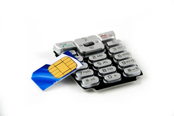 Archivbild von Tastatur und Sim-Karte für Handy — Stockfoto