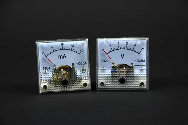 Old and analog current and voltage meters — Stock Photo, Image