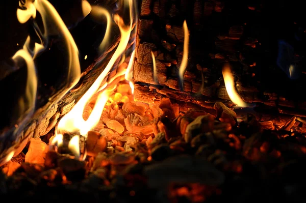 Burning wood in fireplace — Stock Photo, Image
