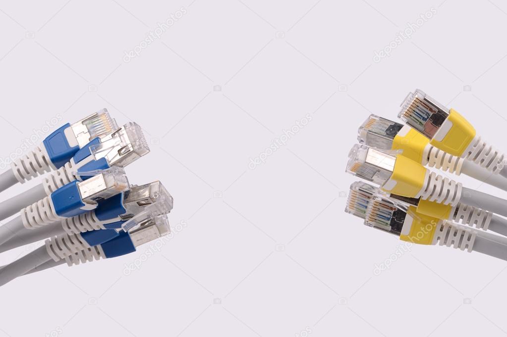 computer network cables over grey background