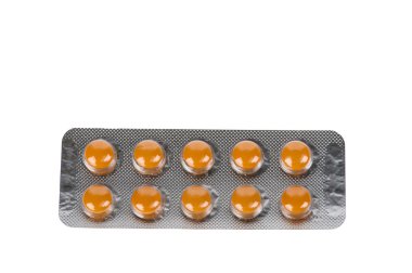 beyaz zemin üzerinde kabarcıklar içinde turuncu hapları