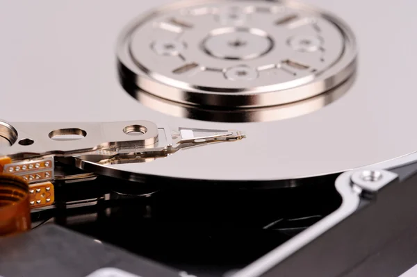 Hard drive mirror surface and reading writing head — Stock Photo, Image