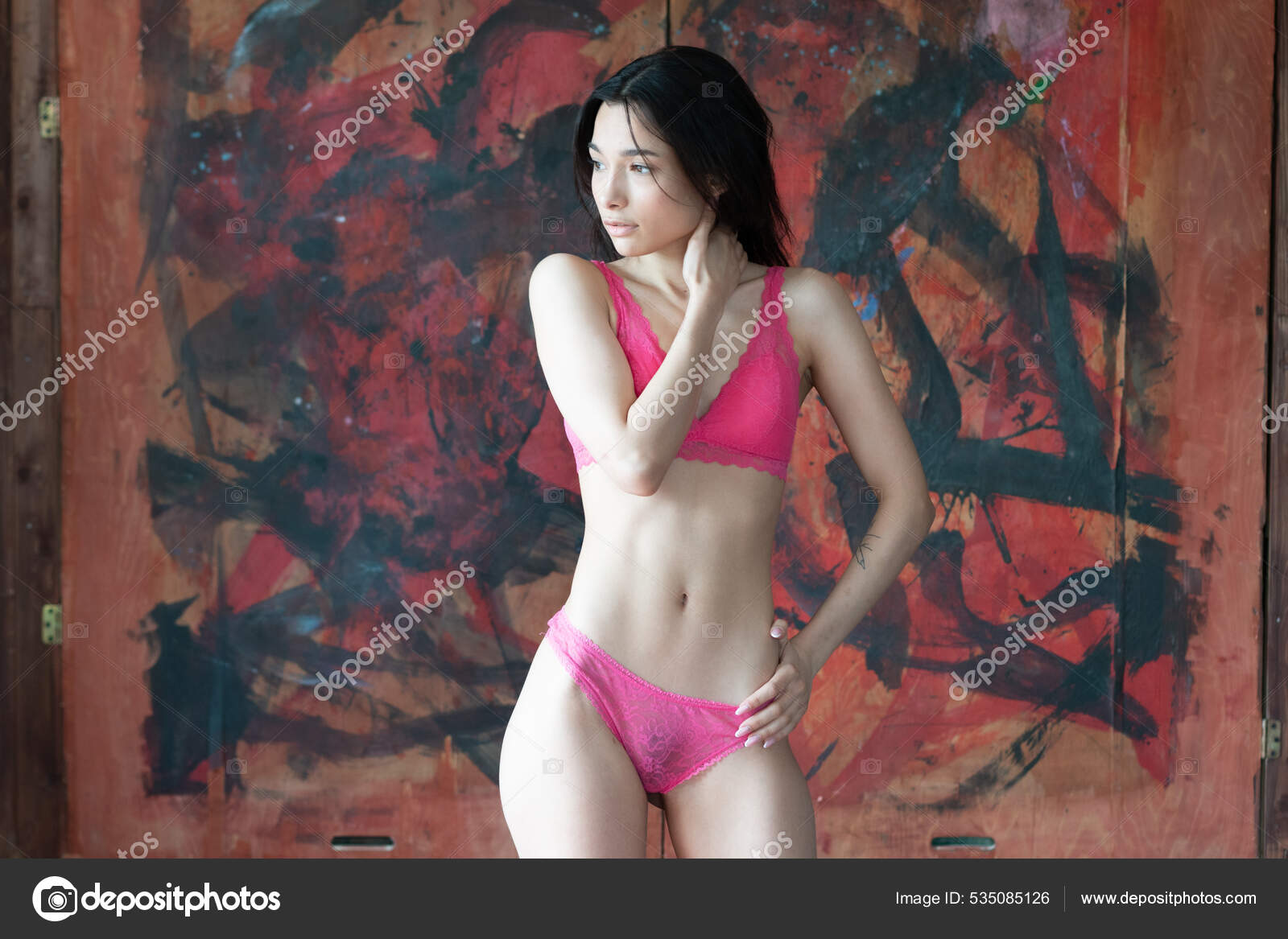 https://st.depositphotos.com/10086424/53508/i/1600/depositphotos_535085126-stock-photo-young-beautiful-woman-posing-red.jpg