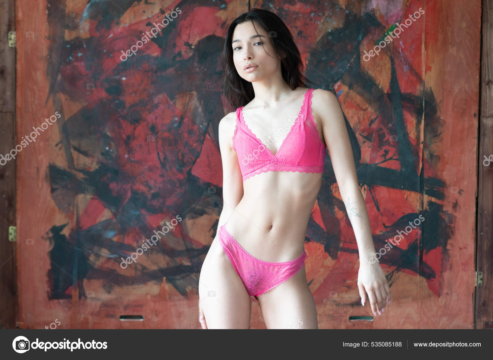 https://st.depositphotos.com/10086424/53508/i/1600/depositphotos_535085188-stock-photo-young-beautiful-woman-posing-red.jpg