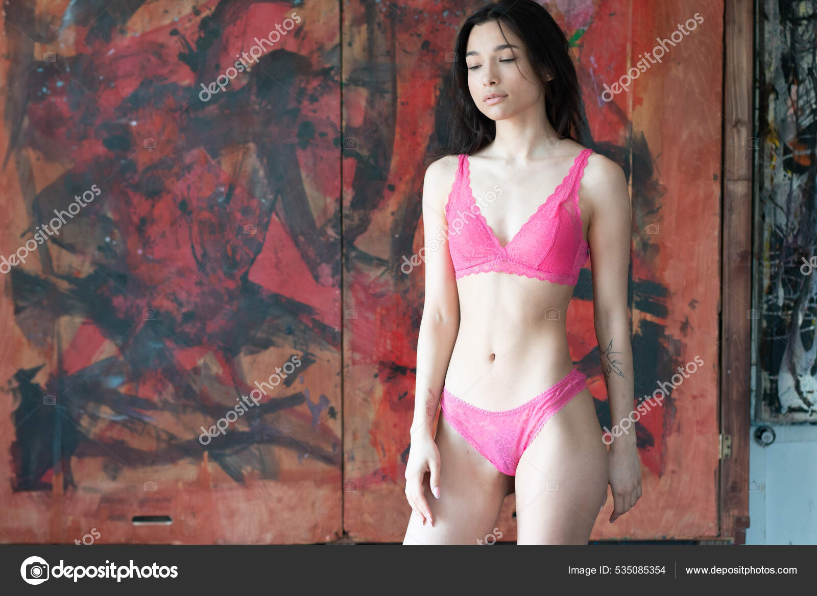 https://st.depositphotos.com/10086424/53508/i/1600/depositphotos_535085354-stock-photo-young-beautiful-woman-posing-red.jpg