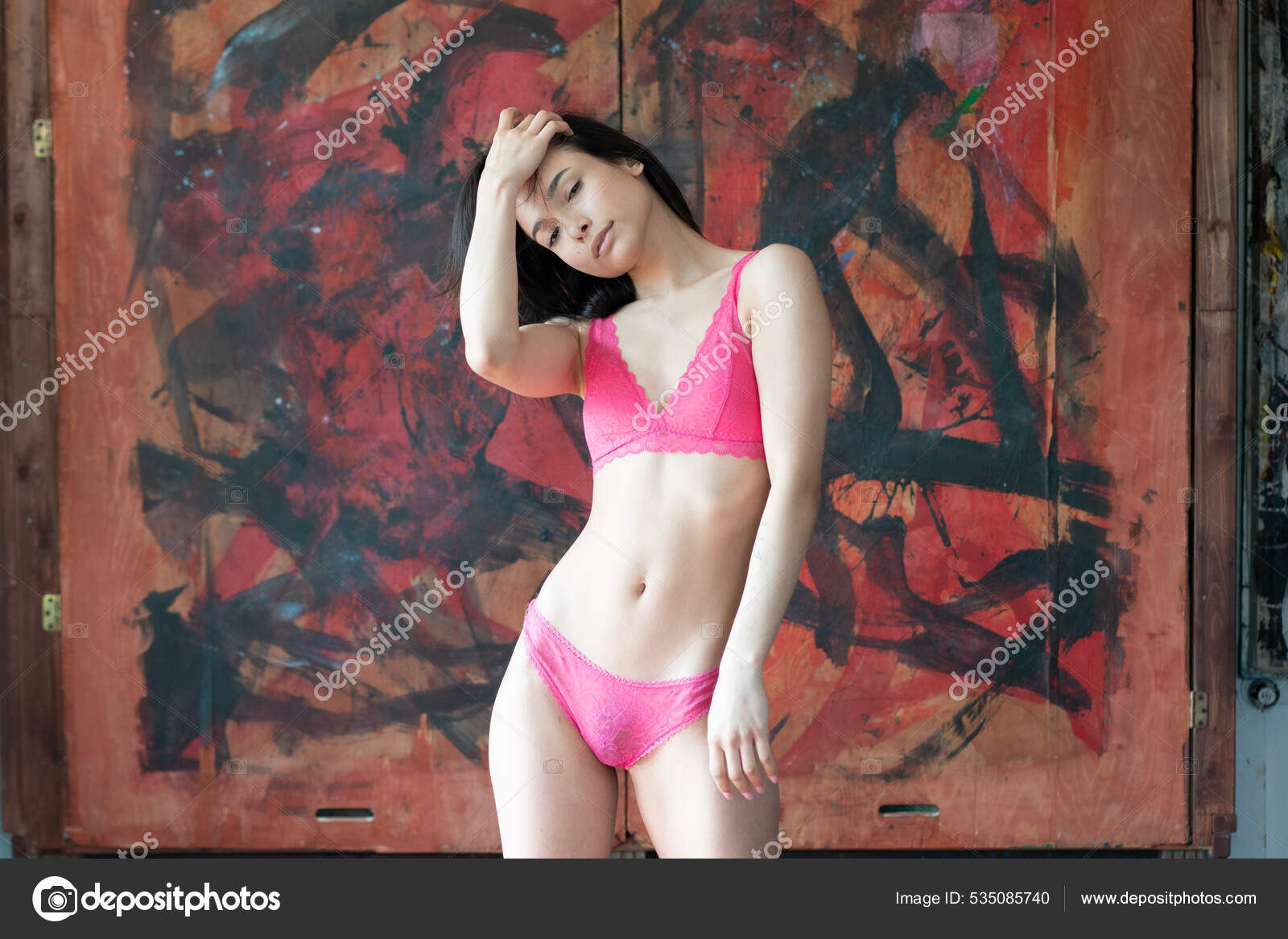 https://st.depositphotos.com/10086424/53508/i/1600/depositphotos_535085740-stock-photo-young-beautiful-woman-posing-red.jpg