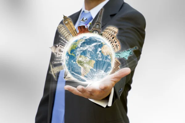 Businessman holding the world in his hand — Stock Photo, Image