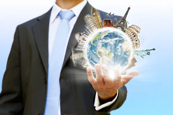 Businessman holding the world in his hand — Stock Photo, Image