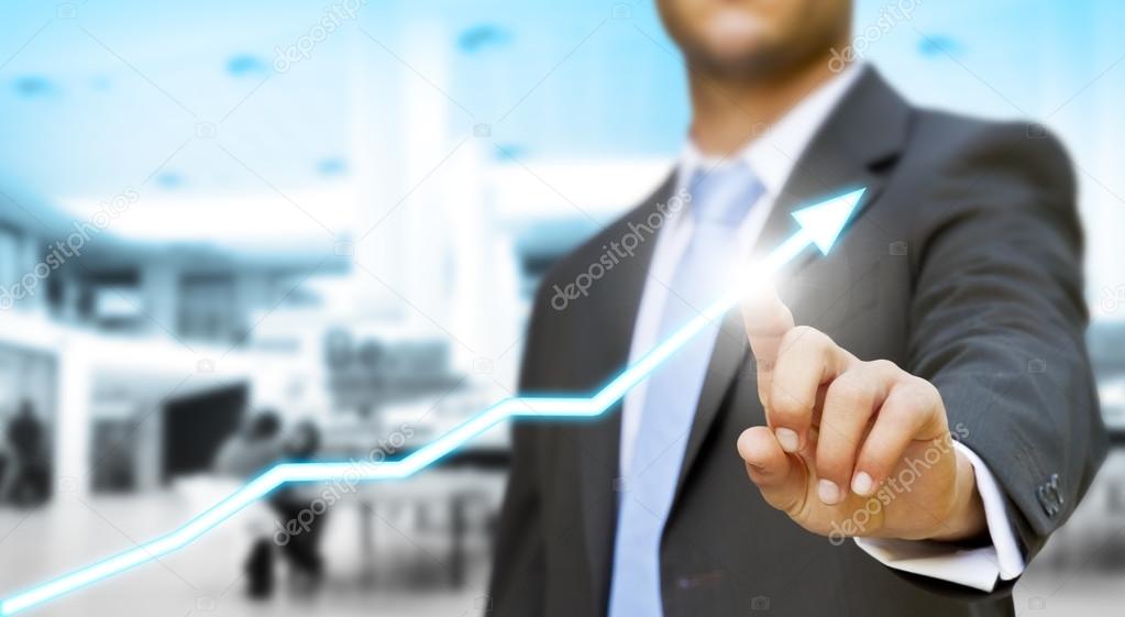 Businessman touching digital graph concept