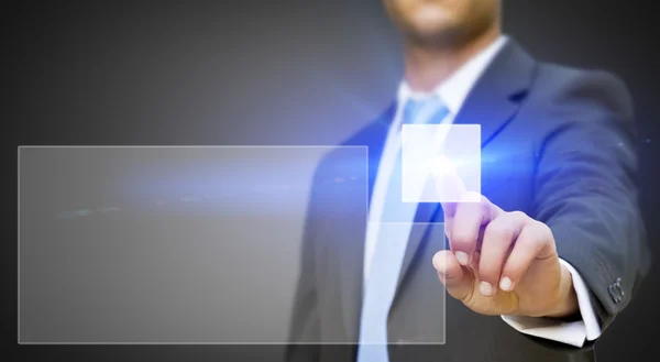 Businessman touching tactile interface — Stock Photo, Image