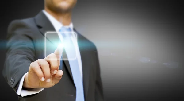 Businessman touching tactile interface — Stock Photo, Image