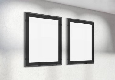 Ofis duvarında asılı iki dikey çerçeve. Modern beton şirketinin 3D döşeme içindeki reklam panolarının maketi
