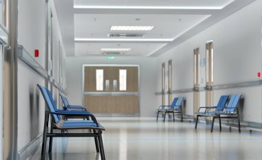 Odaları ve mavi koltukları olan uzun beyaz hastane koridoru. Boş bir kaza ve içinde parlak ışıklar olan acil bir iç mekan.