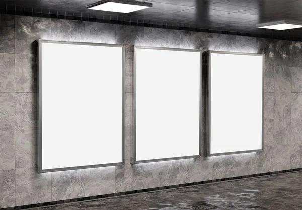 Yeraltı metro duvarında üç tane dikey reklam panosu var. Üç boyutlu reklam tablosu, tren istasyonunun iç mekânına istifçilik.