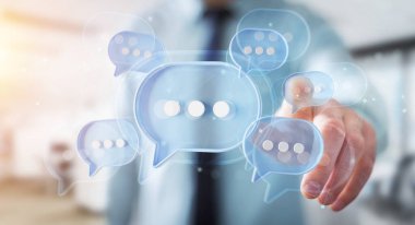 Adam parmaklarıyla dokunuyor. Dijital mavi konuşma balonları ikonlar hakkında konuşuyor. Asgari sohbet ya da sosyal medya mesajları iş adamının elinde yüzüyor. 3B görüntüleme