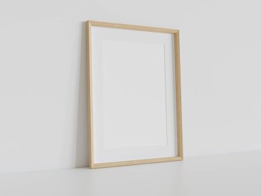 Ahşap dikdörtgen çerçeve, iç döşemede beyaz zemine dayanıyor. 3 boyutlu bir resimde çerçevelenmiş bir resmin şablonu