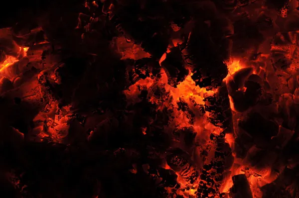 Zářící červené horké uhlíky - požár texturu pozadí Stock Obrázky