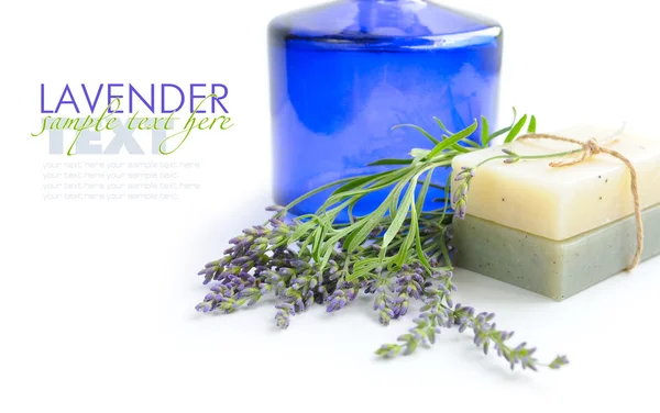 Handmade soap and lavender flowers on a white background — Stock Photo, Image