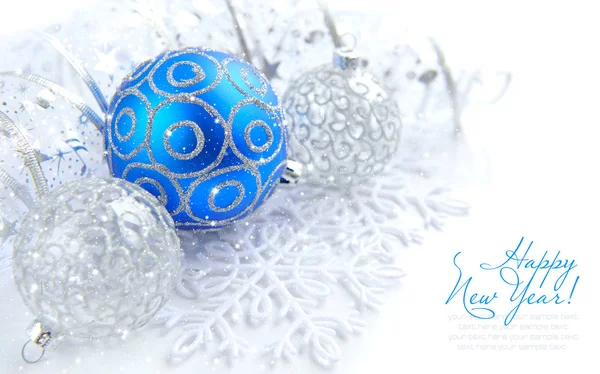 Christmas blue and silver decorations on white with sample text — Stock Photo, Image