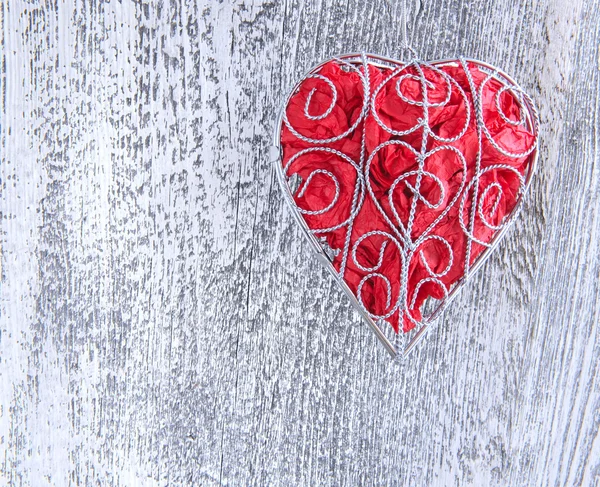 Valentines Day background. Decorative heart on wooden background — Stock Photo, Image