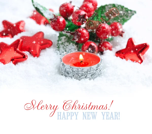 Christmas candle with decorations on snow with space for text — Stock Photo, Image