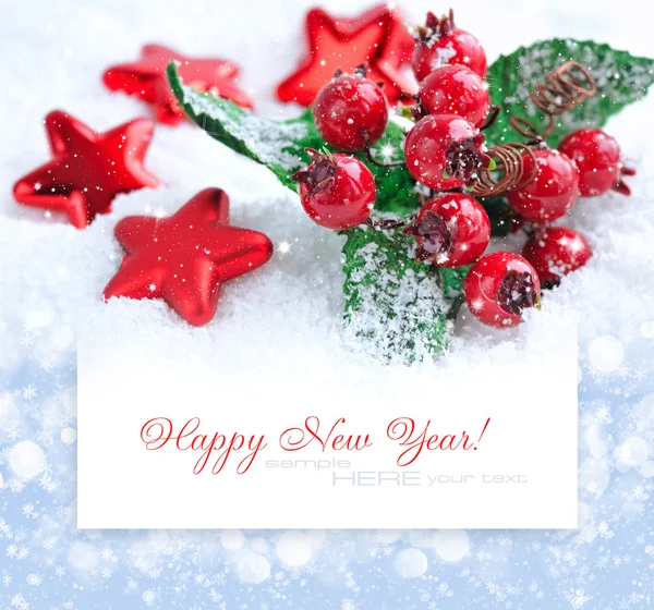 Decorazioni natalizie di gingillo sono con stelle su uno sfondo un postale con testo campione — Foto Stock