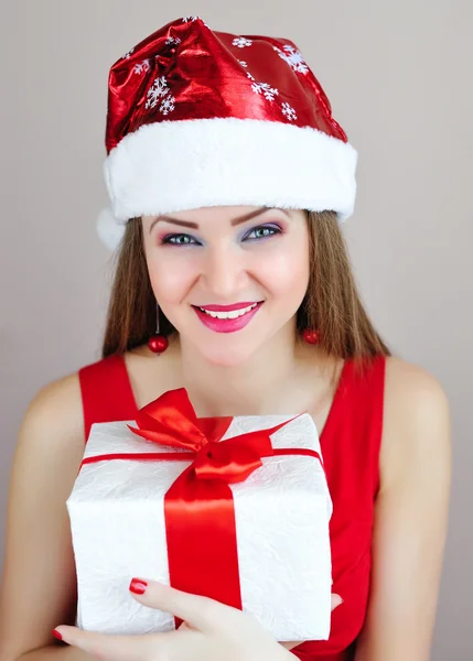 Portrait of beautiful sexy girl with Christmas gift — Stock Photo, Image