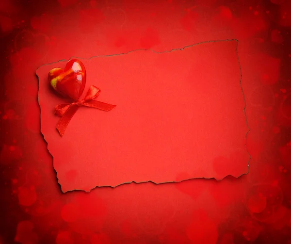 Decorative heart are on the sheet of red paper — Stock Photo, Image
