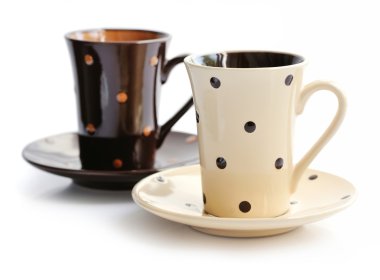 kahve bardakları ve üzerinde beyaz izole daireler