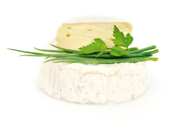 Round camembert cheese with parsley isolated on white — Stock Photo, Image