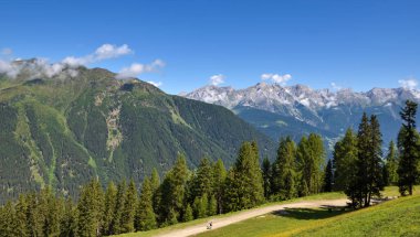 Summer mountain landscape and blue sky with clouds. Location place Alps, Europe.