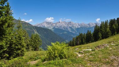 Summer landscape in mountains and blue sky with clouds. Location place Alps, Tyrol, Austria, Europe.