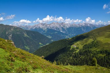 Summer mountain landscape and blue sky with clouds. Location place Alps, Europe.