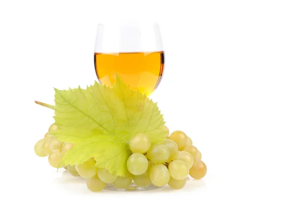 Branch of grapes and glass of wine — Stock Photo, Image