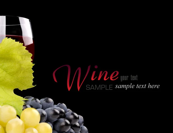 Ramo de uvas y copa de vino — Foto de Stock