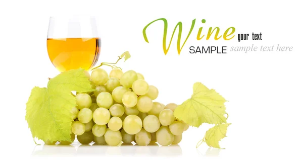 Branch of grapes and glass of wine — Stock Photo, Image