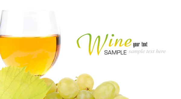 Branch of grapes and glass of wine — Stock Photo, Image