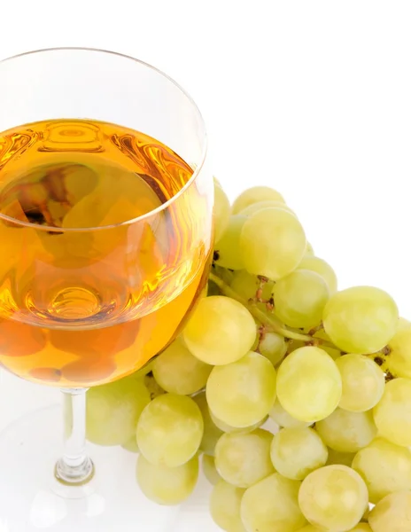 Branch of grapes and glass of wine — Stock Photo, Image