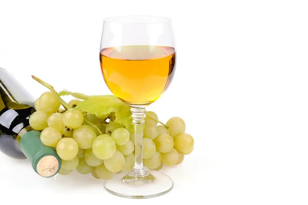 Wine bottle, glass and grapes — Stock Photo, Image