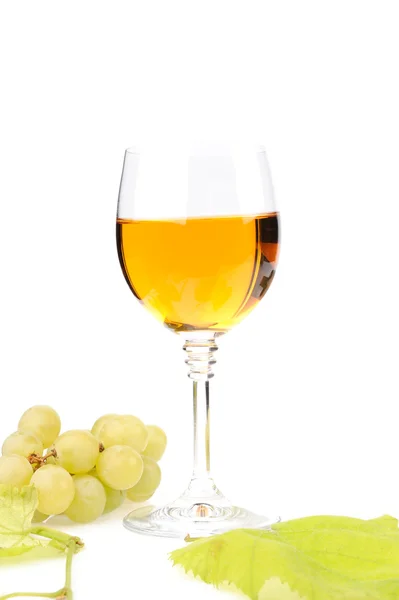 Branch of grapes and glass of wine — Stock Photo, Image