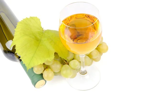 Wine bottle, glass and grapes — Stock Photo, Image