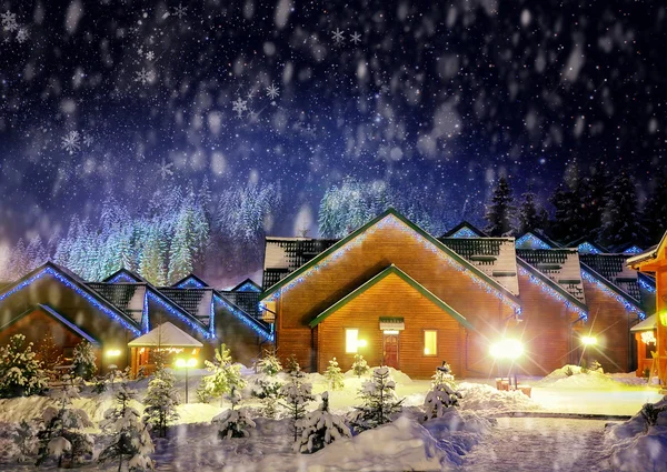 Inredda hus med julbelysning — Stockfoto
