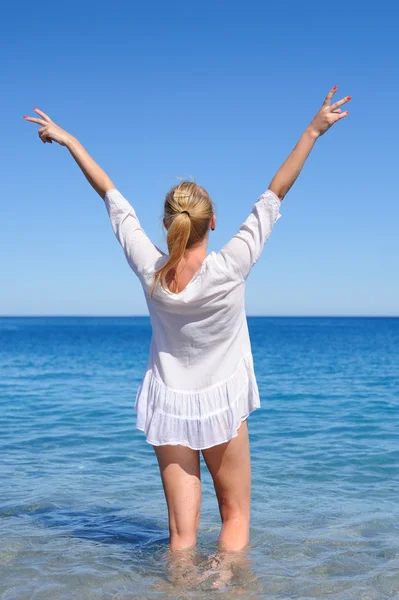 Woman on a beach — Stock Photo, Image