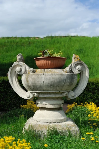 Decorating big stone steps in the summer garden Stock Photo