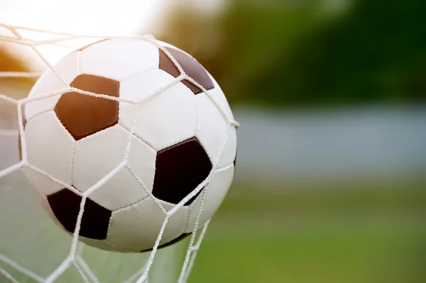 Soccer ball in goal — Stock Photo, Image