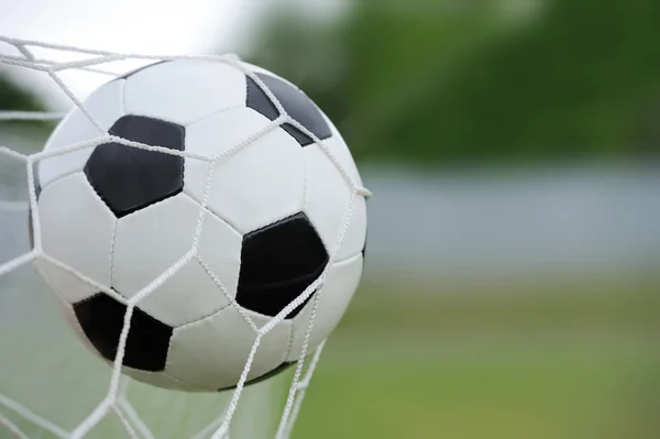 Soccer ball in goal — Stock Photo, Image