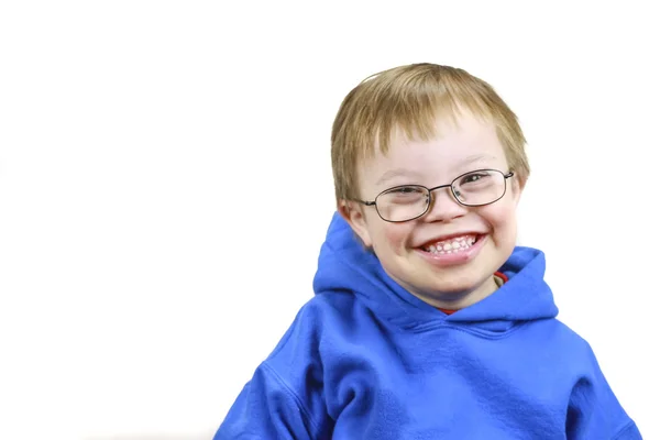 Niño con Síndrome de Downs y sonrisa muy feliz Imagen de stock