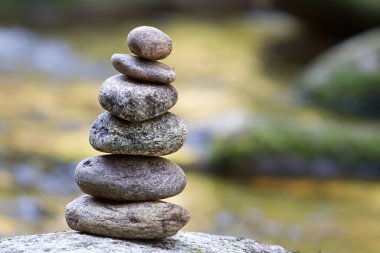 small stones pyramid in nature