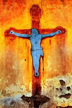 INRI, metal Jesus on the broken church wall